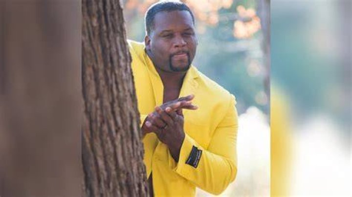 Origin of the Yellow Suit Meme: The Photo That Sparked Millions of Reactions
