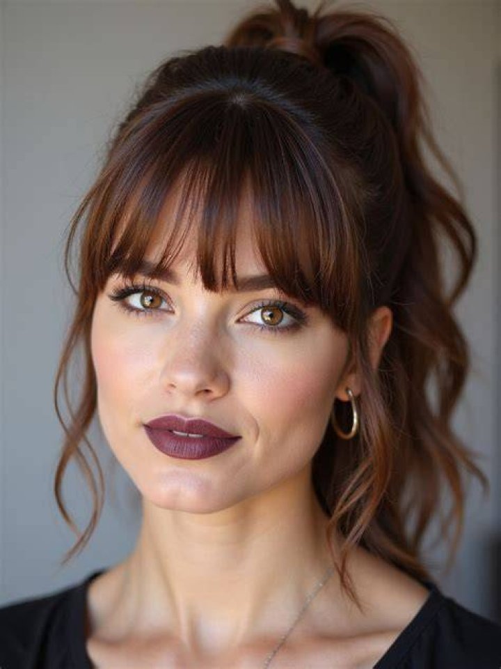 Does a Ponytail with Bangs Actually Flatter Every Face Shape? Stylists Weigh In